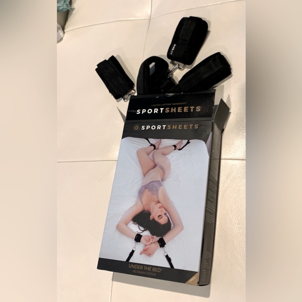 Sport sheets restraint system (new) was a gag gift at a woman’s party